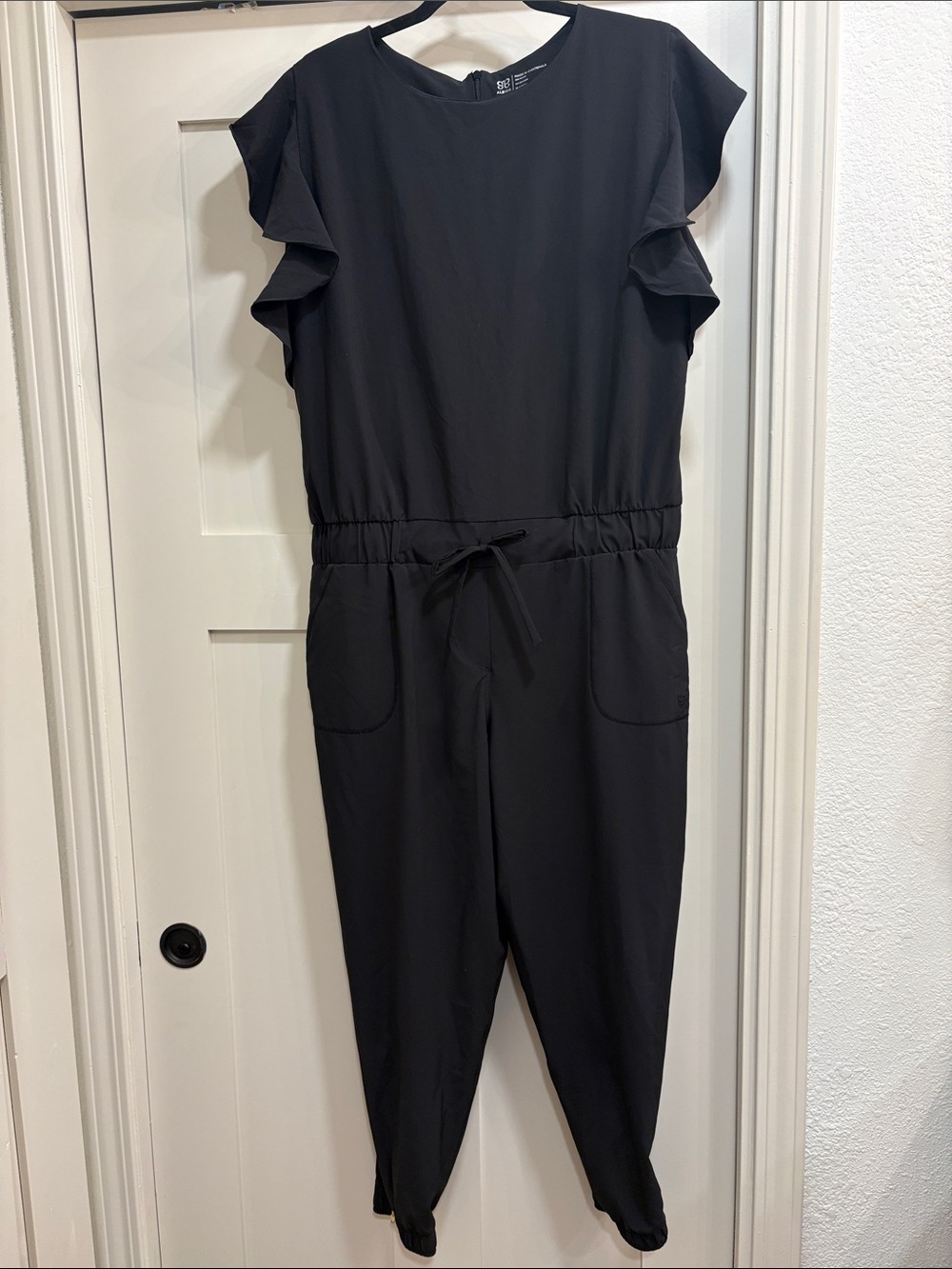 Albion Black Ruffle-Sleeve Drawstring Jumpsuit